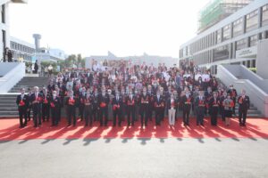 A group photo of all guests at the flag-raising ceremony.