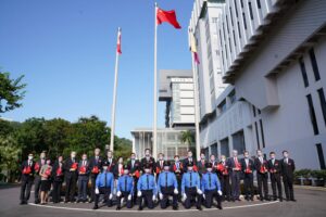 A group photo of official guests, University officers and the flag-raising team.