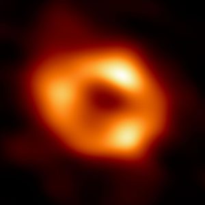 The Event Horizon Telescope (EHT) has recently unveiled the first image of Sagittarius A*. The image captures the “silhouettes” of the black hole. The gas around the black hole is bent by its powerful gravity. As a result, the gas falling into the galactic black hole is heated to billions of degrees and emits powerful radiation near the black hole, resulting in a bright, ring-like structure in the images. Image credit: The Event Horizon Telescope