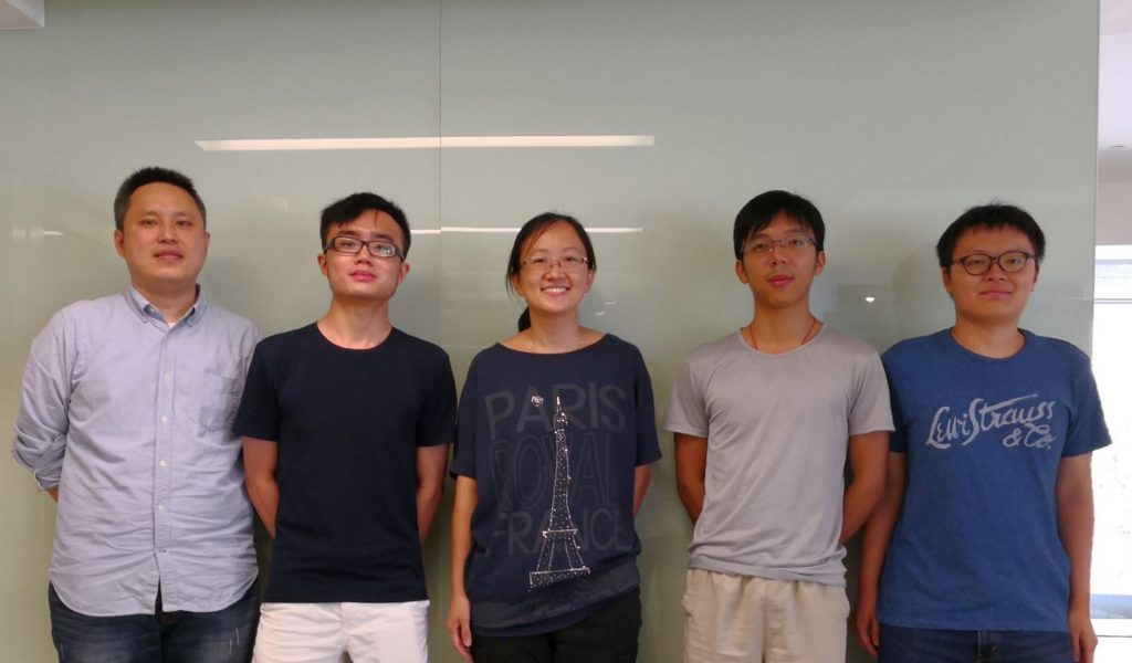 Professor WANG Yi, Associate Professor, Department of Physics, CUHK (middle) and her research team.