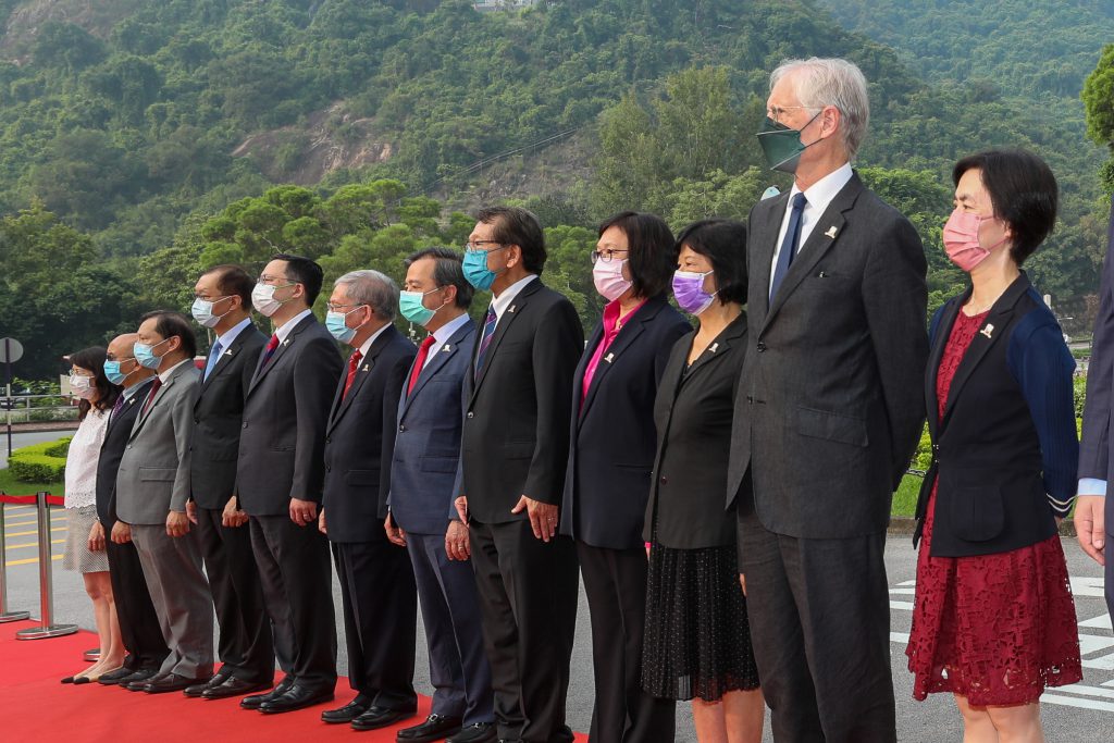 Professor Rocky S. Tuan (five from right), Vice-Chancellor and President of CUHK, Professor Alan K.L. Chan (six from right), Provost of CUHK, senior management, together with other members of the CUHK community attend the Flag-raising Ceremony.