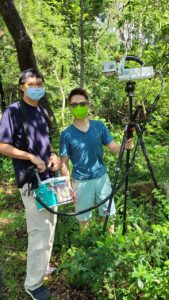 Professor Amos Tai (right) and Dr. Felix Leung (left) measure photosynthesis capacity of plants.