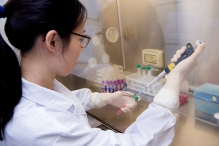 Researcher demonstrates the test of dust-stimulation on blood sample in the laboratory.