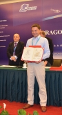 Prof. Daniele Perissin receives the 'Dragon Programme' award at the 'Dragon II' Symposium