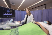 Professor Liona POON demonstrates the measurement of uterine artery pulsatility index of a pregnant woman through ultra-sound.