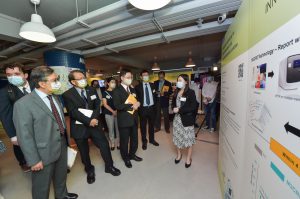 Mr. Alfred SIT, Secretary for Innovation and Technology, tours the exhibition booths hosted by CUHK at its Innovation Day.