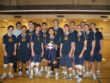 Siron pictures with the volleyball team of the University of Michigan