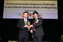 Professor Kenneth Young, Acting Vice-Chancellor of The Chinese University of Hong Kong (right) presented a souvenir to Professor K. C. Chan, Secretary for Financial Services and the Treasury (left). Professor Kenneth Young said human capital has been an important element indispensable for the success of Hong Kong and CUHK strives to enhance Hong Kong’s strategic position as a hub of international trade and finance through nurturing of future financial talents.