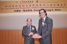 Mr. Michael Wong presents a souvenir to Prof. Mello