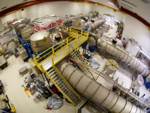 An overhead view of vacuum chambers and beam tube sections in one of LIGO's Laser and Vacuum Equipment Areas (LVEA). (Photo credit: LIGO Laboratory/Corey Gray)