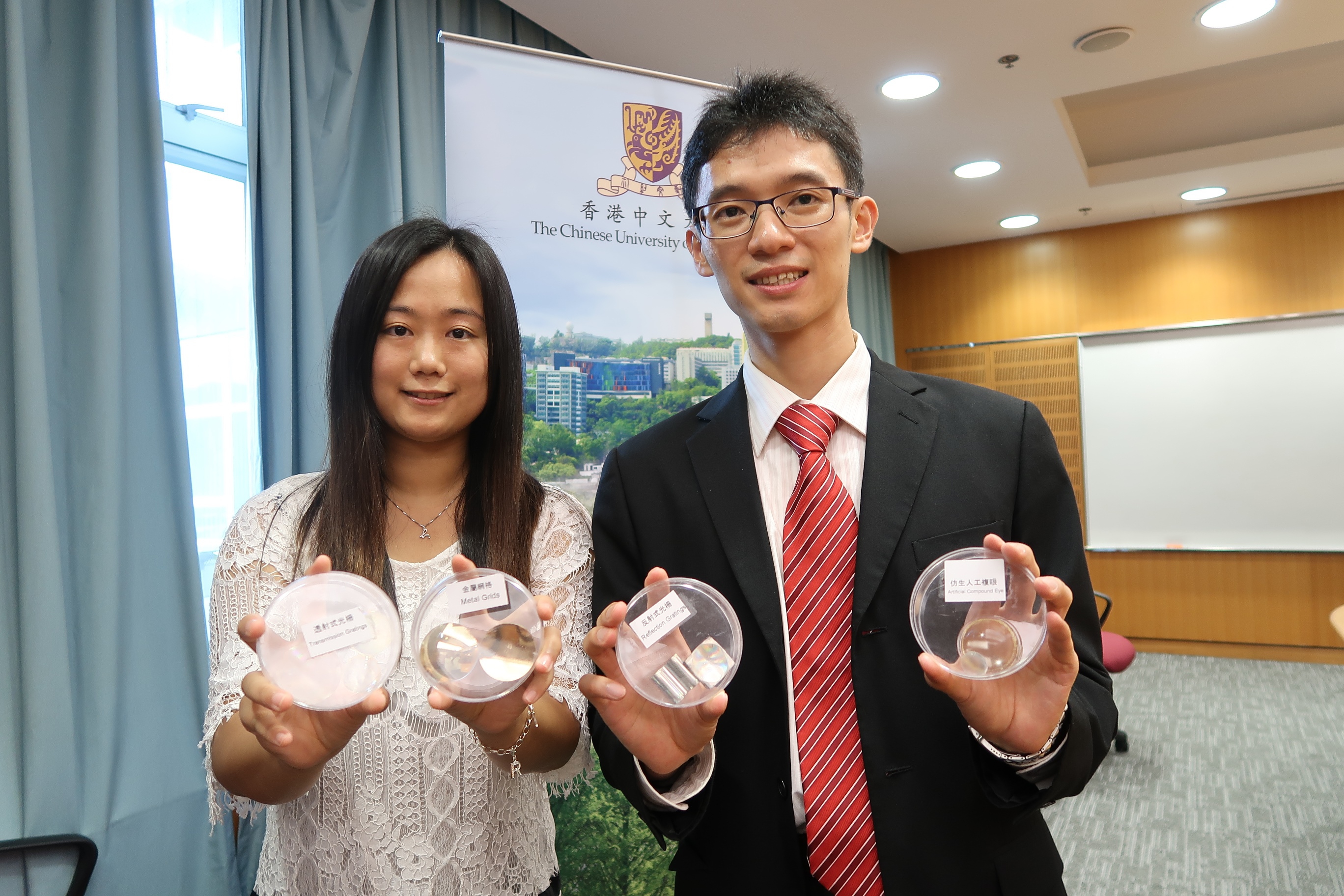 The project winning Grand Prize for innovation and also the First-Class Award of Mechanical and Control System is a vacuum nanoimprinting system developed by CHEN Jianwei, a PhD student from the Multiscale Precision Instrumentation Laboratory of the Department of Mechanical and Automation Engineering, CUHK (right).