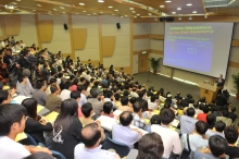 The lecture receives a full house of about 300 audiences