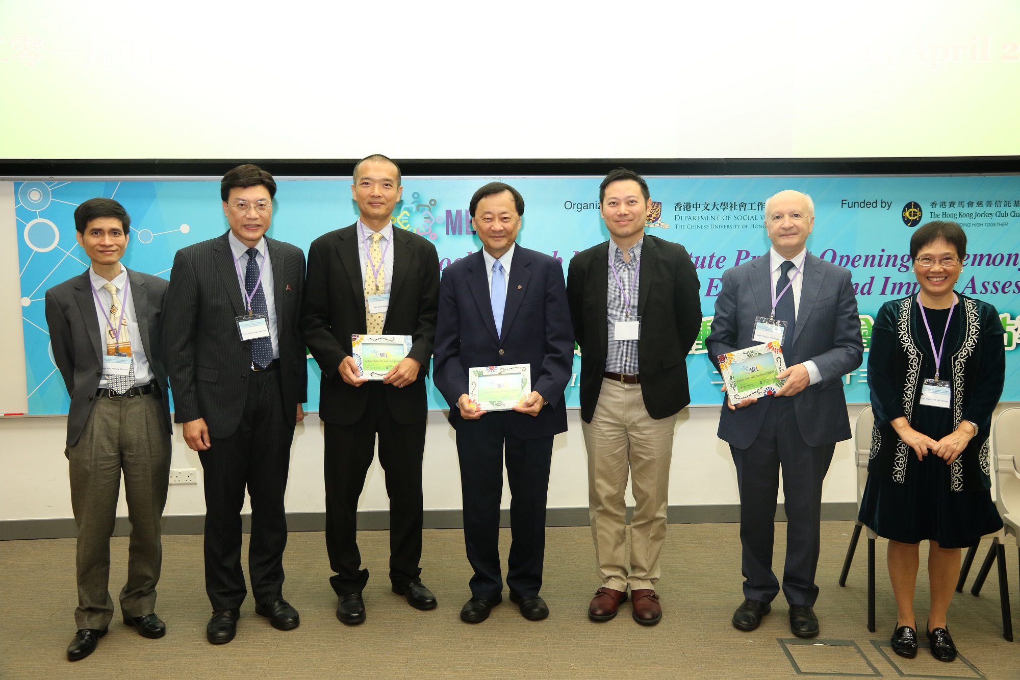 Officiating guests at the Opening Ceremony: (from left) Prof. Jacky Cheung Chau Kiu, Department of Social and Behavioral Sciences, City University of Hong Kong; Prof. Steven Ngai Sek Yum, Chairperson of Department of Social Work, CUHK; Mr. Bryan Wong, Executive Manager, Charities (Strategy and Business Management), The Hong Kong Jockey Club; Prof. Benjamin Wah Wan Sang, Provost of CUHK; Mr. Caspar Tsui Ying Wai, Under Secretary for Labour and Welfare, Hong Kong SAR Government; Prof. Tiziano Vecchiato, Board Member, Zancan Foundation (Padova, Italy); Professor Joyce Ma Lai Chong, Department of Social Work, CUHK