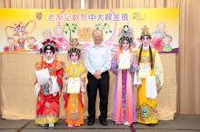 Prof. Michael Hui, Pro-Vice-Chancellor of CUHK (middle) presents certificates of appreciation to little Cantonese opera performers.