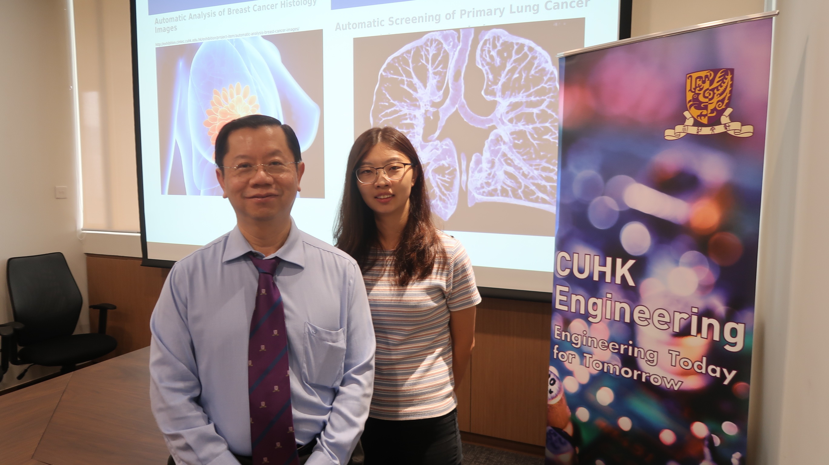 Prof. HENG Pheng Ann, Professor, Department of Computer Science and Engineering, CUHK (left) and his PhD student DOU Qi.