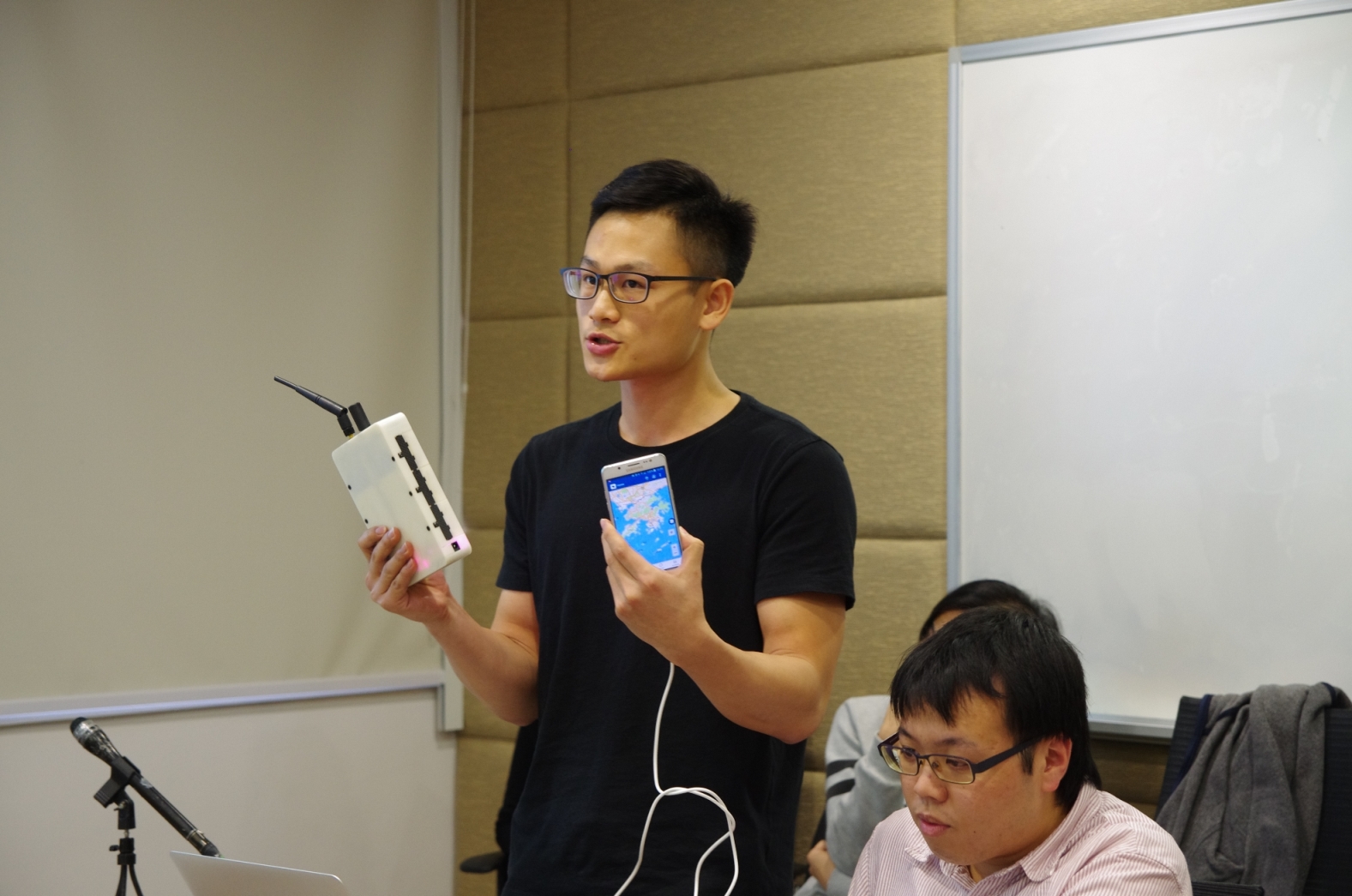 The research team member is introducing the mobile sensor node.