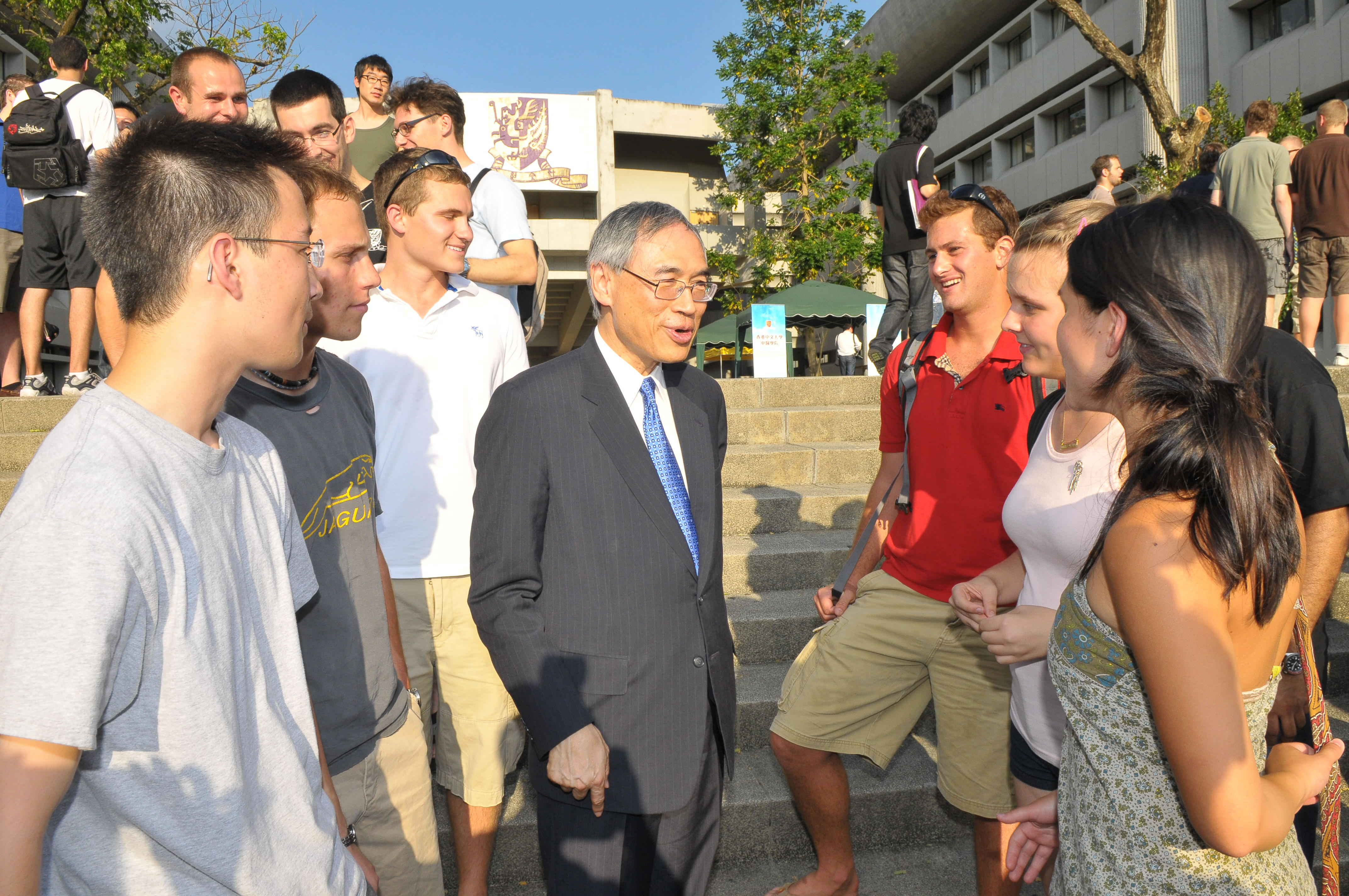 Professer Lawrence J. Lau mingles with the overseas exchange students