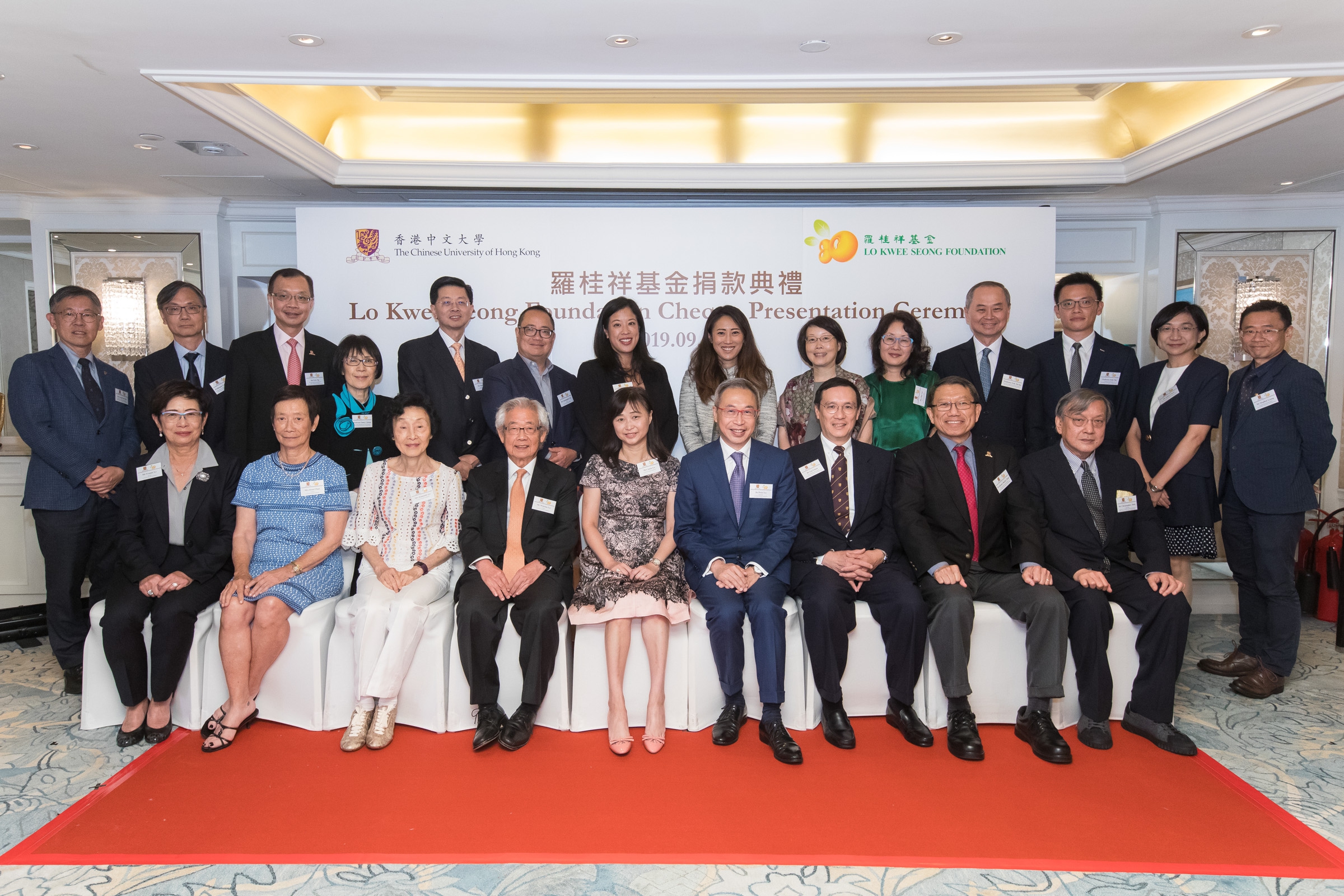 A group photo of the guests after the cheque presentation ceremony.