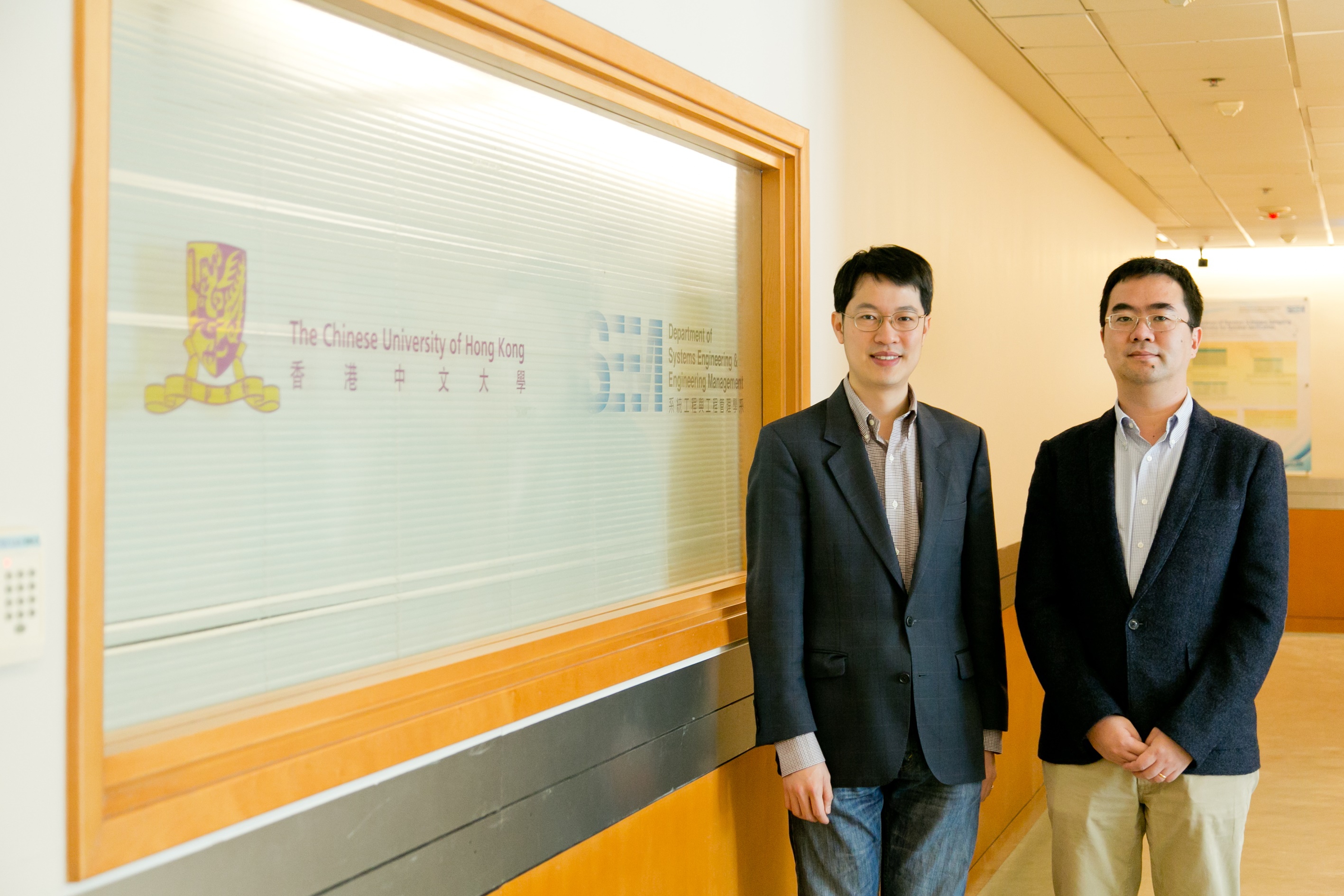 Prof. So Man-Cho Anthony, Assistant Dean (Student Affairs), Faculty of Engineering (left) and Prof Chen Nan, Programme Director of FinTech, CUHK.