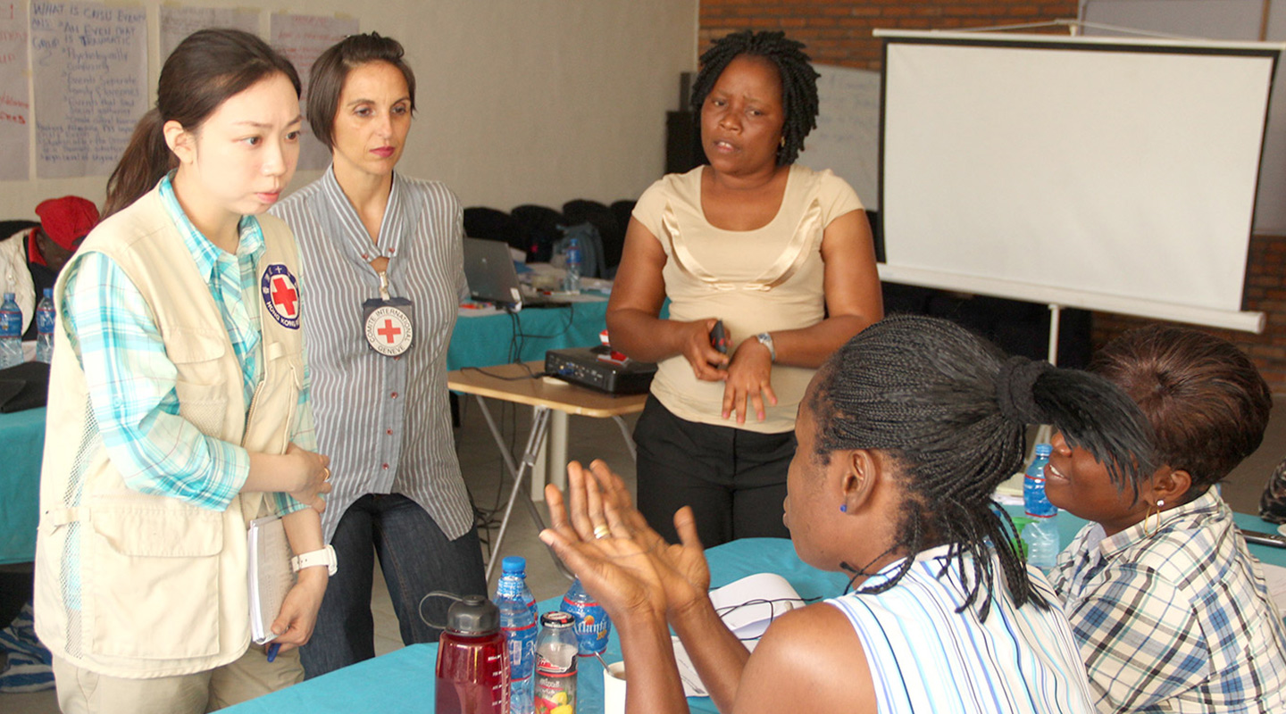 Conducting a training session for local counsellors in Liberia