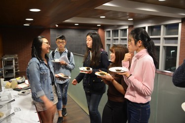 Students chat after the talk