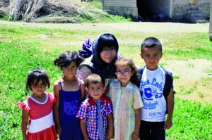 Sherry Chan in Dogubayazit, Turkey, with Kurdish children