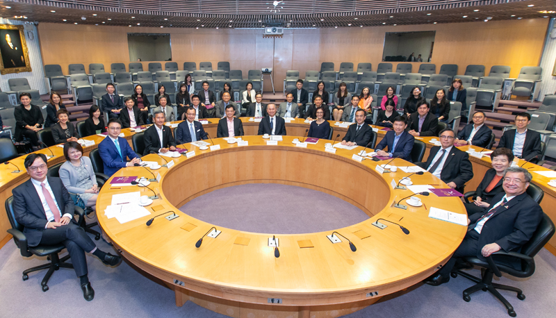 CUHK representatives and the Singapore government delegates.