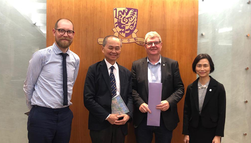 Prof. Wong Suk-ying (1st right) and Prof. FOK Tai-fai (2nd left) warmly welcome delegates from University of Cambridge.