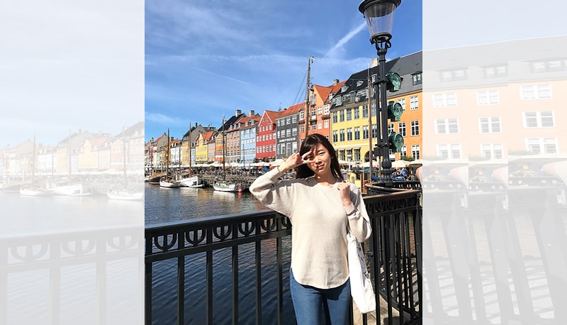 Wen Ying tours at Nyhavn—the canal area surrounded by colourful houses and historical buildings.