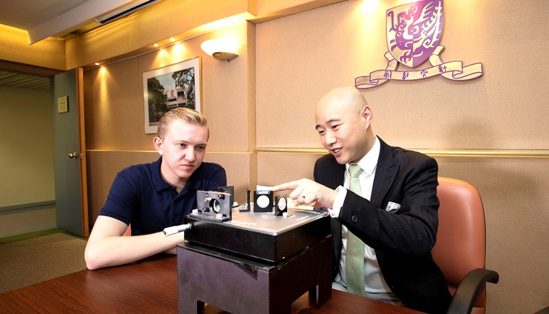 Prof. Tjonnie Li working with Mesut Caliskan during his visit to CUHK in the summer of 2019.