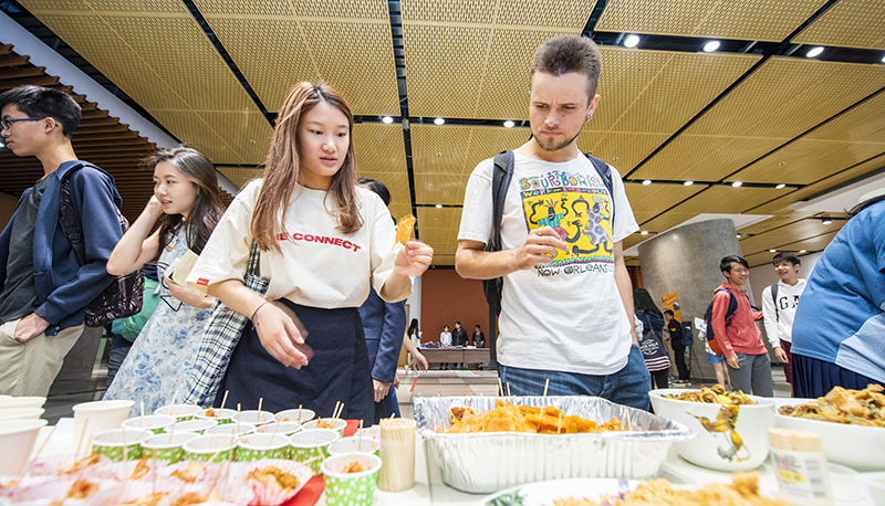 International students are amazed by the varieties of food and local snacks from different countries.