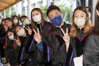 Graduates celebrating their academic achievements and embarkment on a new journey