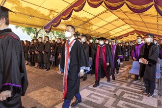 Processing members proceeding to the University Mall 