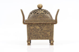 Iron Ding-Shaped Incense Burner with Gold Damascene and Bird Motifs<br />
Late Ming<br />
Mark reading “Made in the Xuande Period of Great Ming”<br />
Xian Qu Xuan Collection