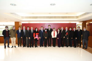 CUHK Council Chairman Professor John Chai Yat-Chiu (9th right) and other university members attend the flag-raising ceremony on New Year’s Day.