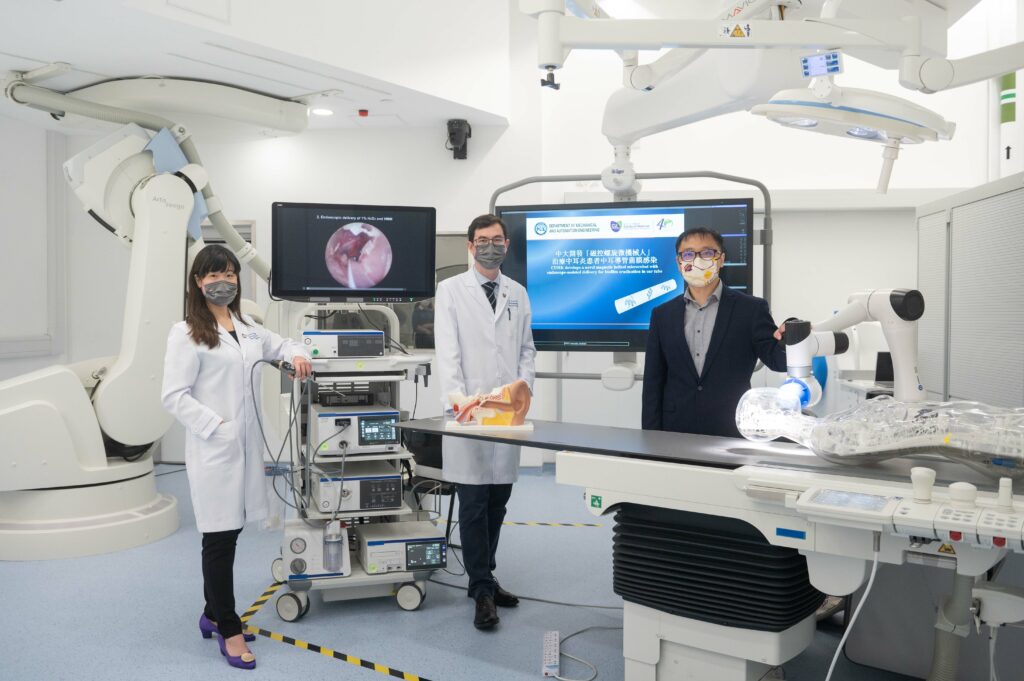 CUHK’s cross disciplinary research team developed a magnetic helical microrobot with endoscope-assisted delivery for biofilm eradication in ear tubes. <br />
<br />
(From left) Assistant Professor Dr Chang Wai-tsz and Associate Professor Dr Jason Chan from the Department of Otorhinolaryngology, Head and Neck Surgery at CU Medicine; and Professor Zhang Li from the Department of Mechanical and Automation Engineering.