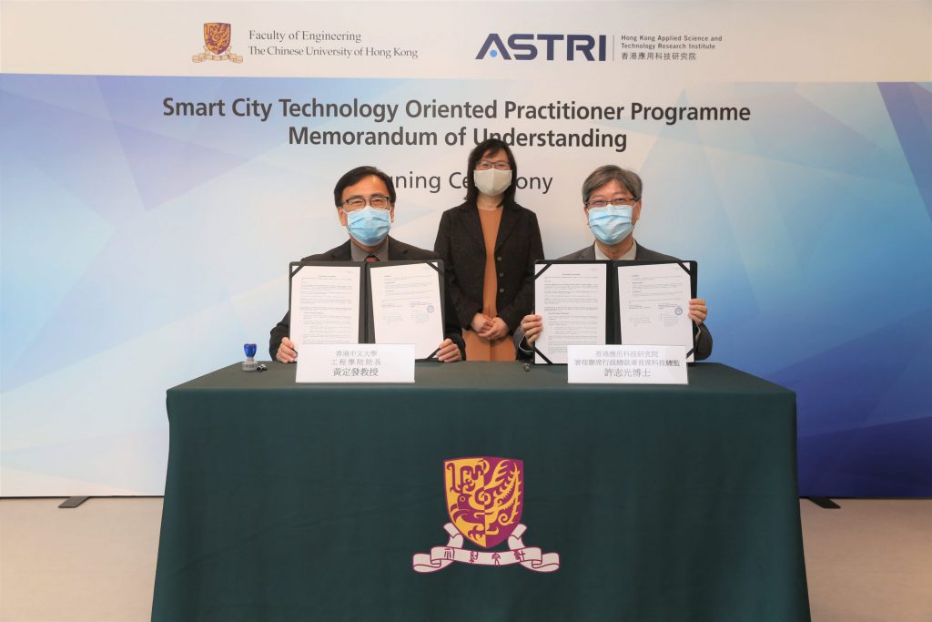 Witnessed by Ms Rebecca Pun, JP, Commissioner of Innovation and Technology (centre); Dr Lucas Hui, Acting Co-CEO cum Chief Technology Officer, ASTRI (right); and Prof Martin D. F. Wong, Dean, Faculty of Engineering, CUHK (left) sign the MOU for Smart City Technology Oriented Practitioner Programme.