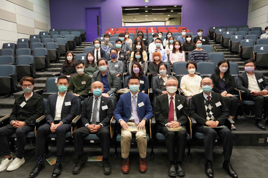 A group photo of award recipients with guests.