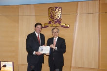 The Lt Governor presents a commendation certificate to Vice-Chancellor Prof Lau in recognition of the green campus initiatives of CUHK.