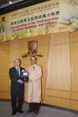 Prof. Liu Pak-wai (left) presents a souvenir to Mr. Bhaktivinod.