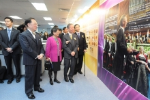 Officiating guests touring around the exhibition