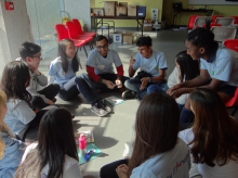 Local and non-local students participating in the CLOVER Programme have a group discussion