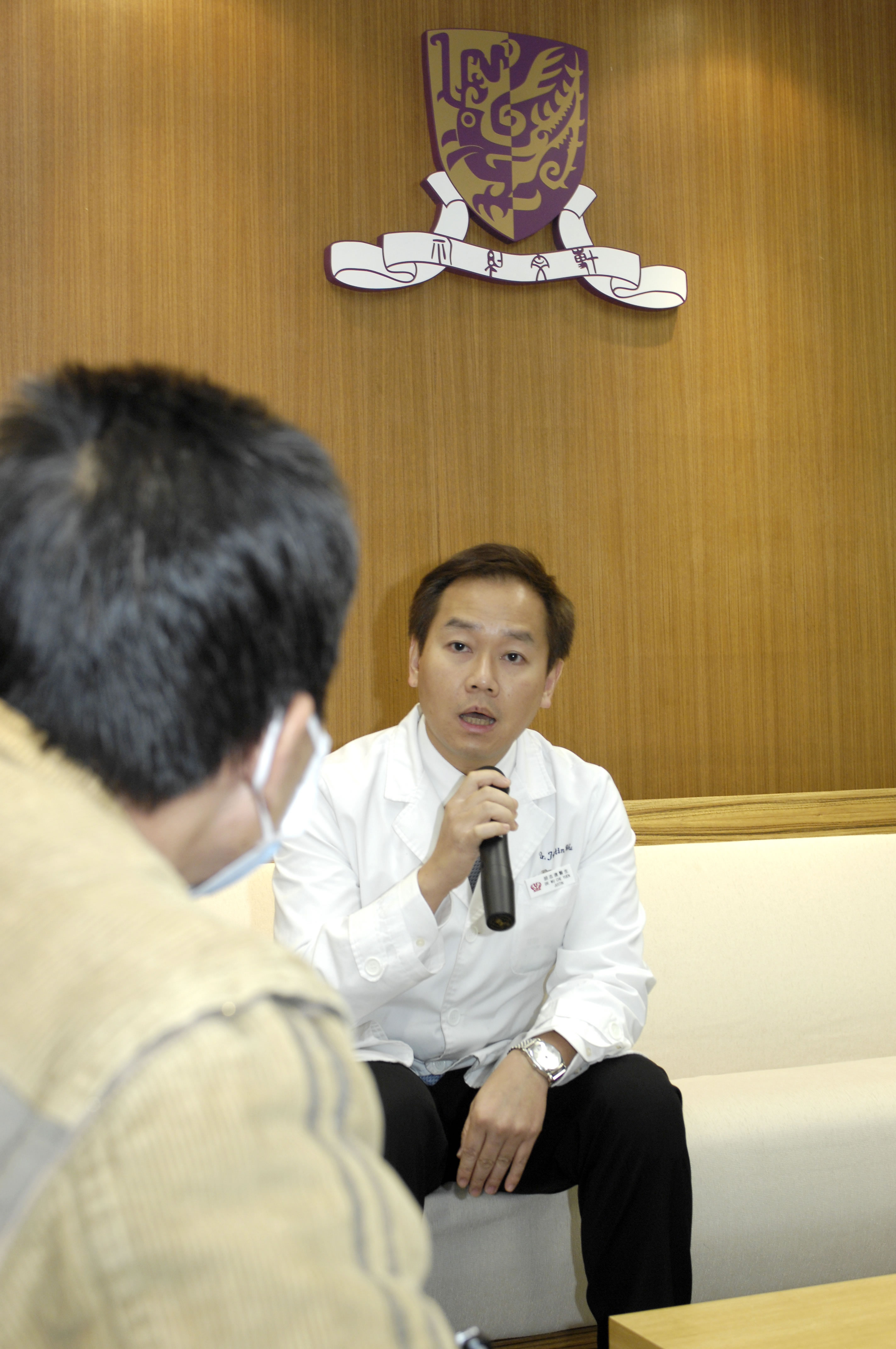 Professor Justin Wu, Associate Professor, Department of Medicine & Therapeutics, Faculty of Medicine, CUHK with Mr Wong, an IBS patient