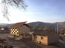 The Dou Pavilion originates in the Checkered Playroom, a kindergarten model built in Gansu Province in China.