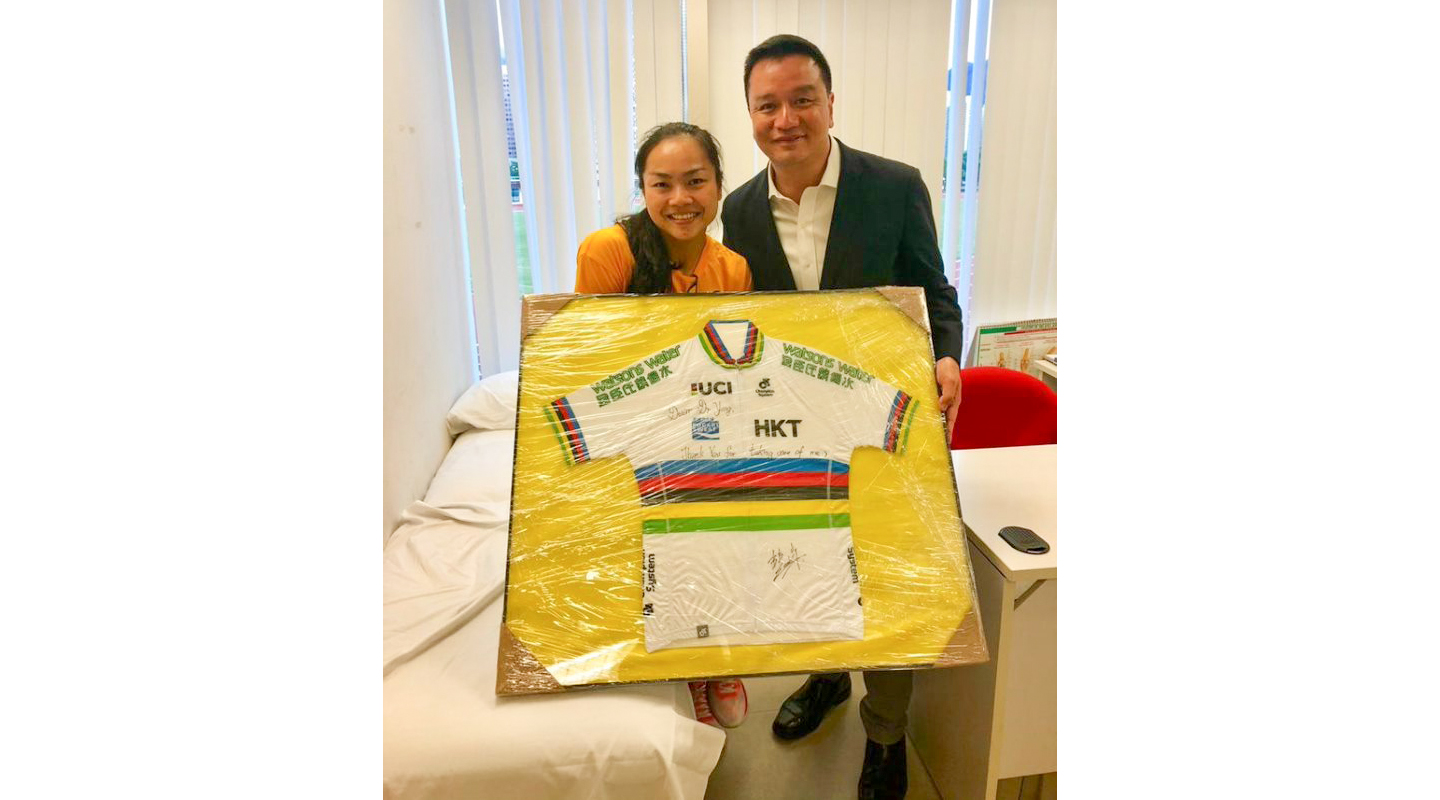 Sarah Lee gifting her rainbow jersey <em>(courtesy of interviewee)</em>