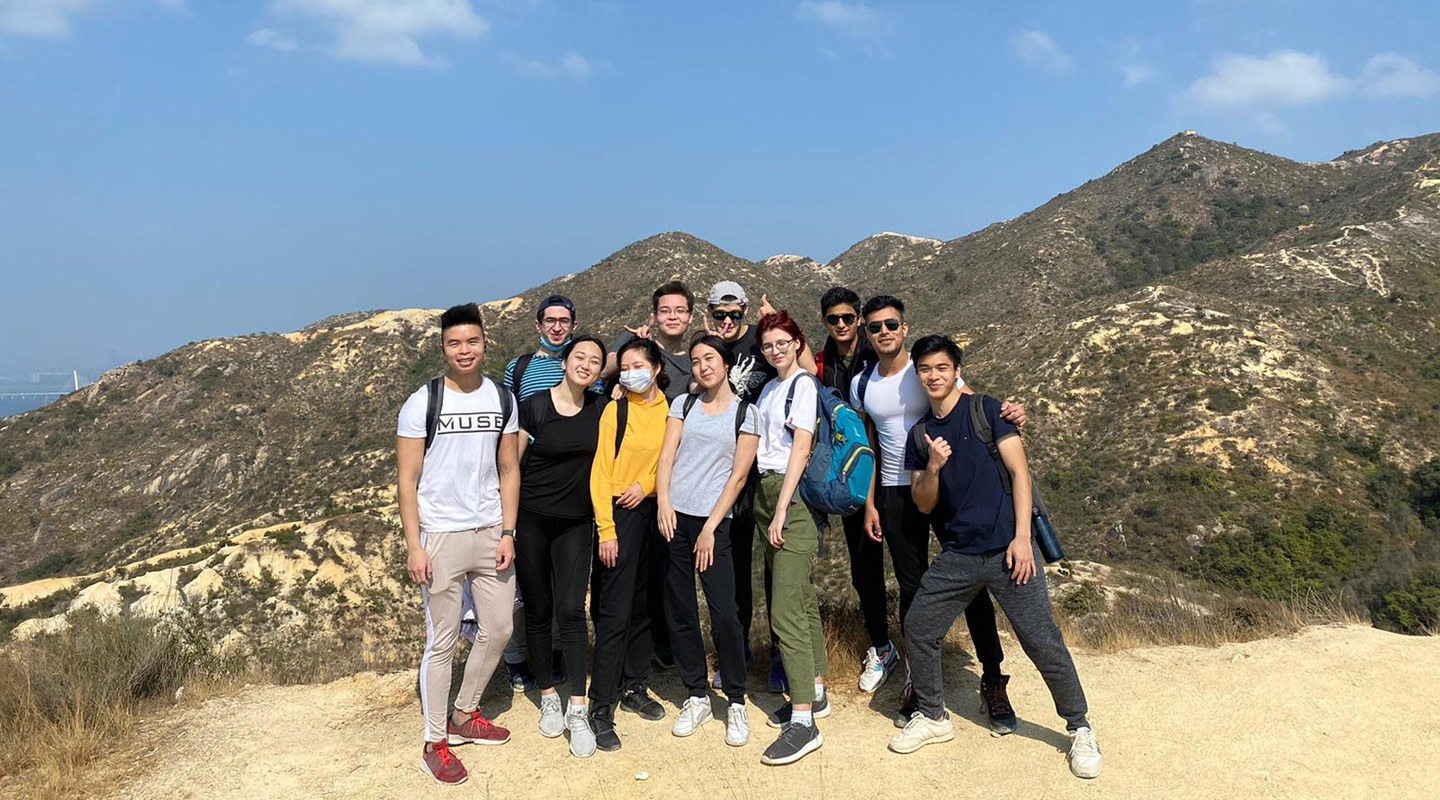 Khachatur <em>(1<sup>st</sup> left, back row)</em> and Andy <em>(1<sup>st</sup> right, front row)</em> go hiking with their friends <em>(courtesy of interviewee)</em>