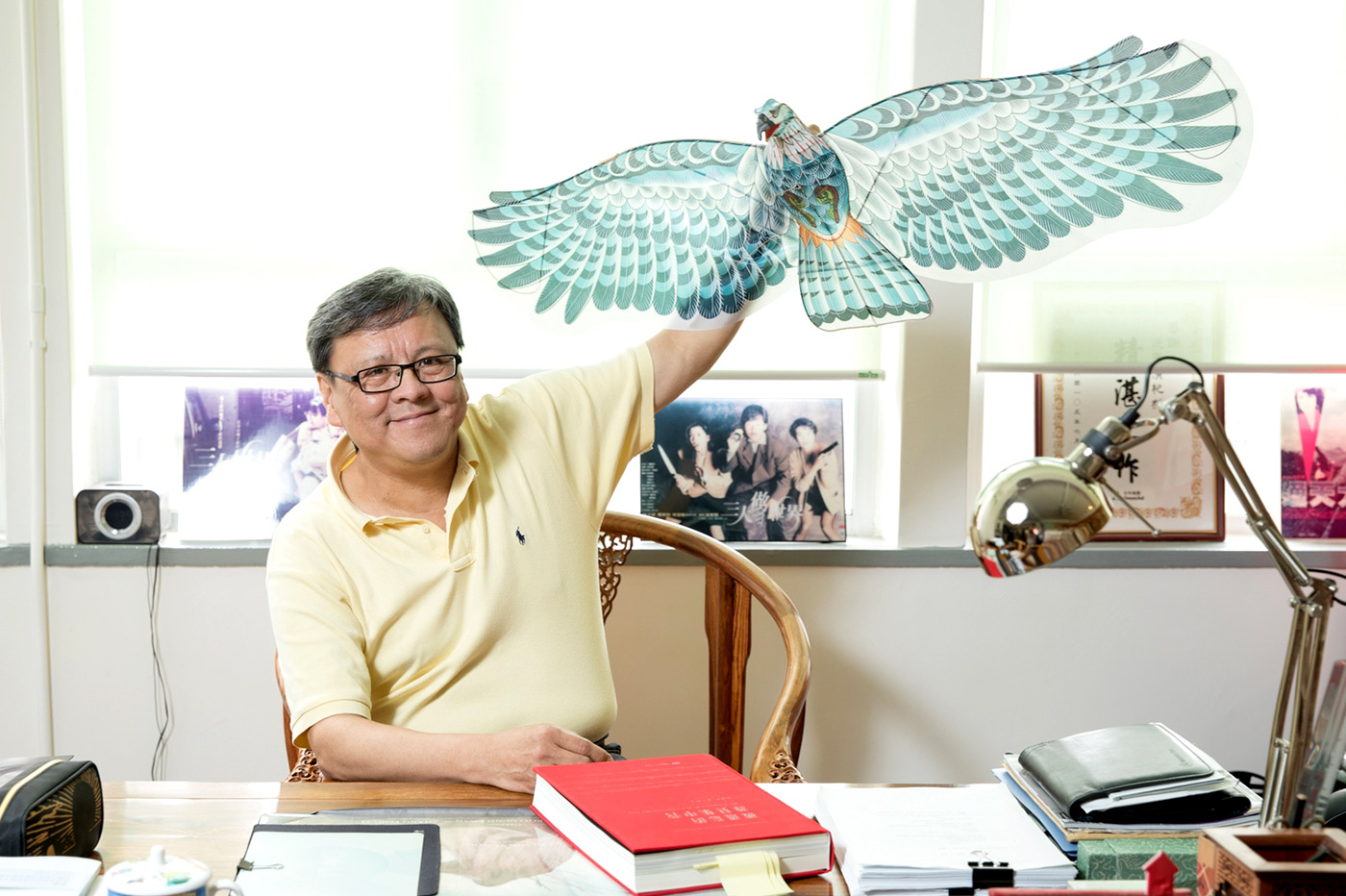 Stephen Shin with the kite that symbolizes hope in <em>The Last Race</em> <em>(Photo by Keith Hiro)</em>