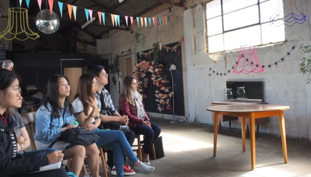 Students listen to a talk 