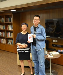 Xu Xi with Ambrose Chan, winner of one of the books and contributor to this news piece