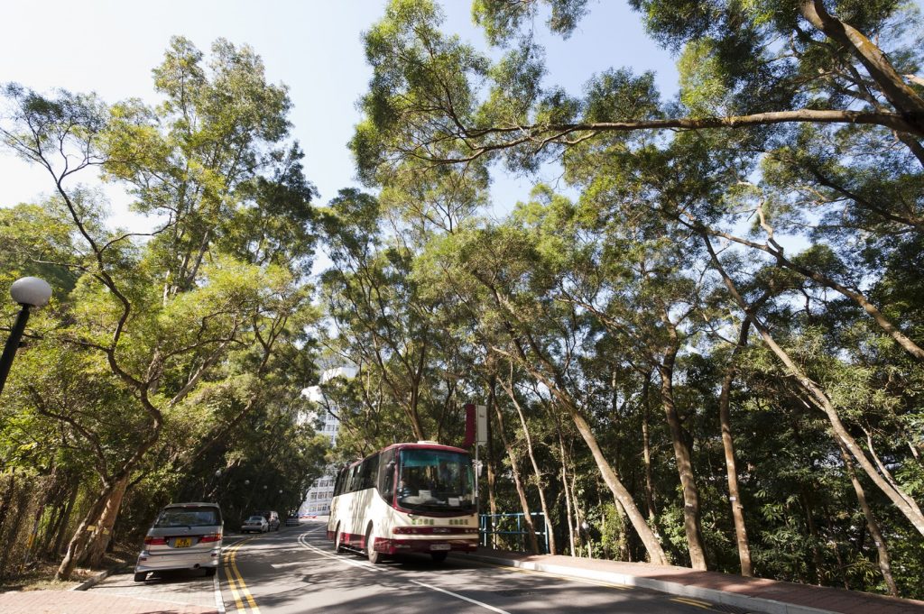 Squeezing in a crowded school bus and balance yourself is quite challenging. (ISO, CUHK)